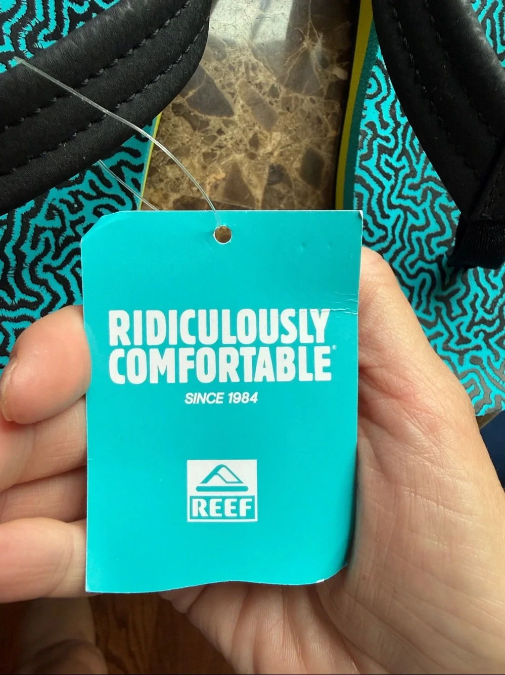 NWT Big boys size 5 Reef flip flops. Blue Coral design. Black and blue.